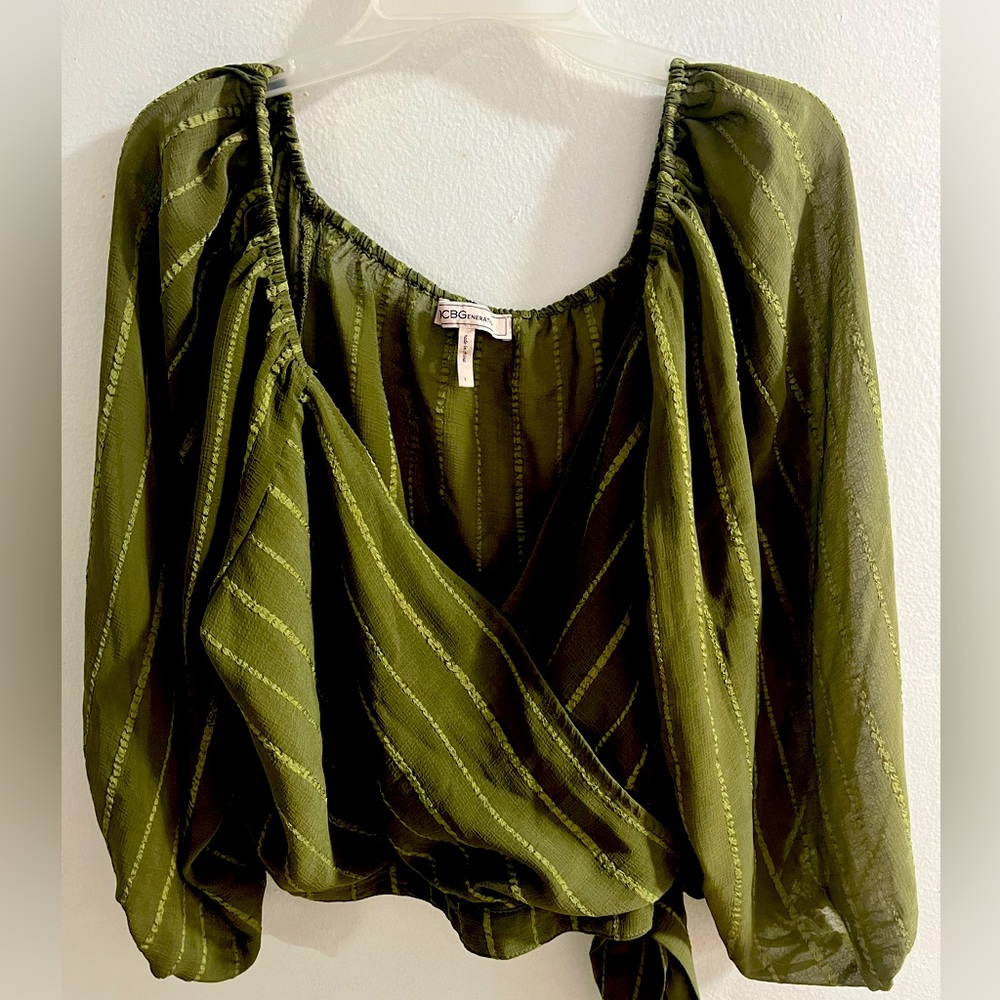 Olive green, cropped going out shirt.